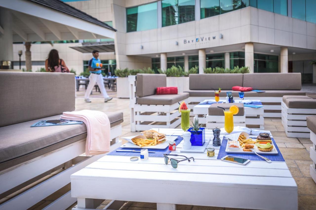Beach Rotana - All Suites Abu Dhabi Exterior photo